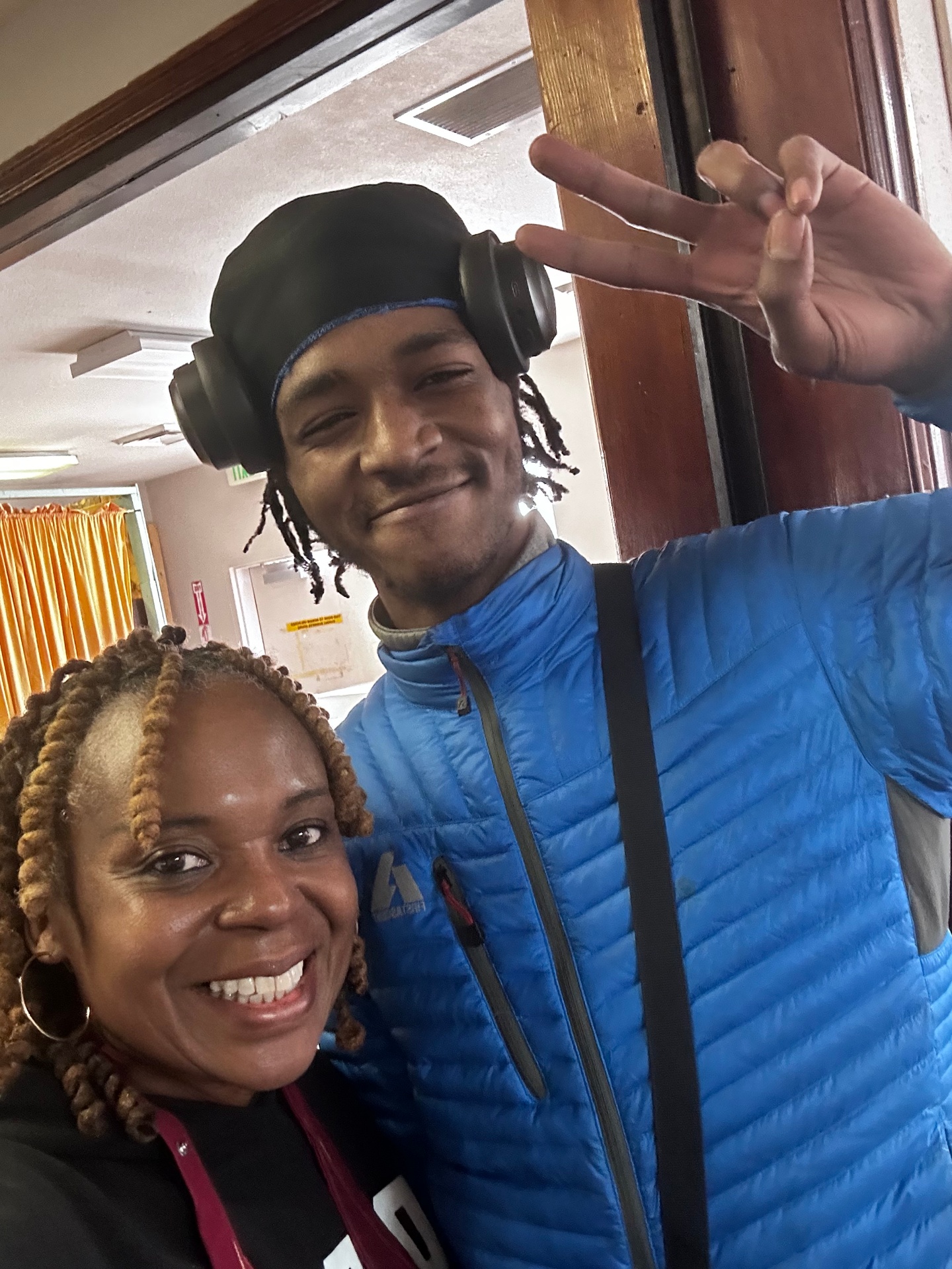 Youth smiling and celebrating together at a Mahari In Motion program event